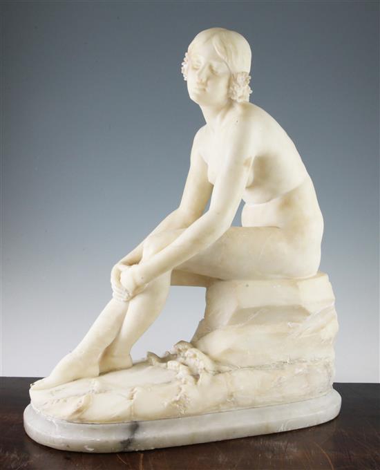 A late 19th / early 20th century carved alabaster model of a seated female nude, 20in.